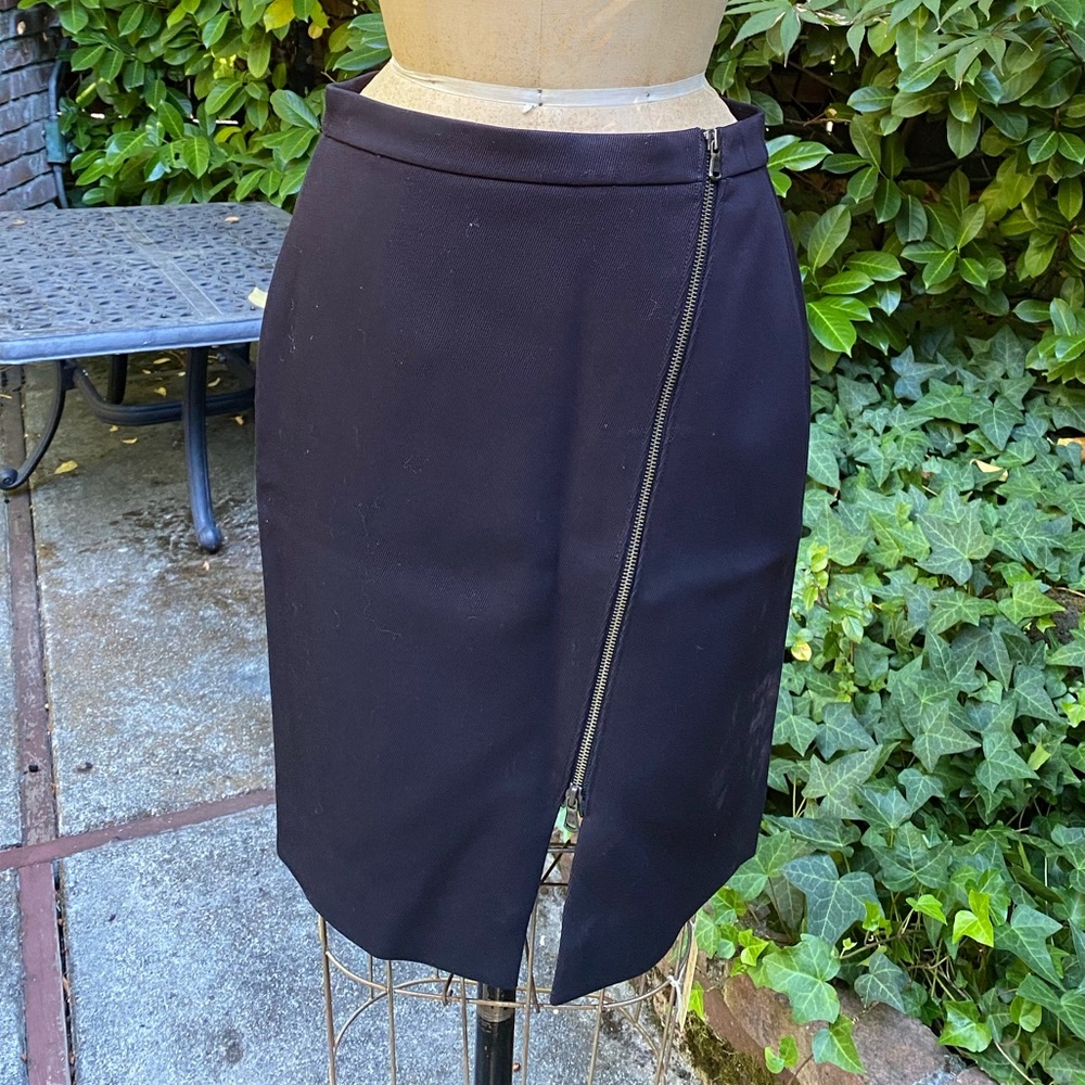 J. Crew black pencil skirt with asymmetrical brass zipper across front. Size 6P